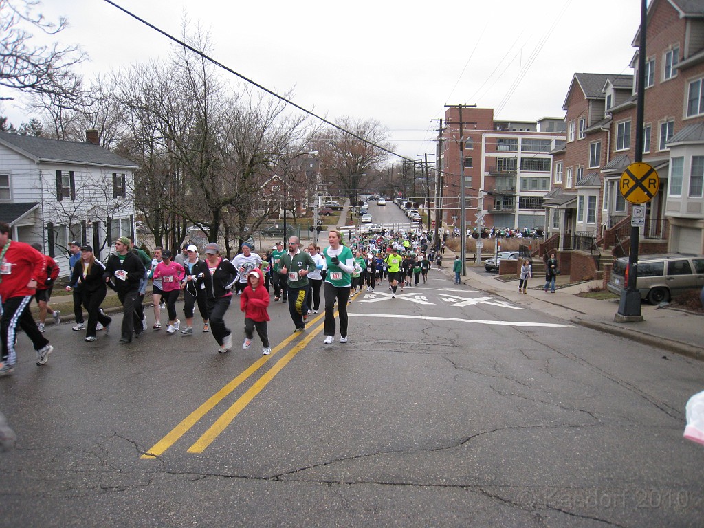 Shamrocks and Shenanigans 5K 2010 0610.jpg - The 2010 Shamrocks and Shenanigans 5K race in Ann Arbor MI. Cool and damp, and crowded. Gonna have to grind up this hill................